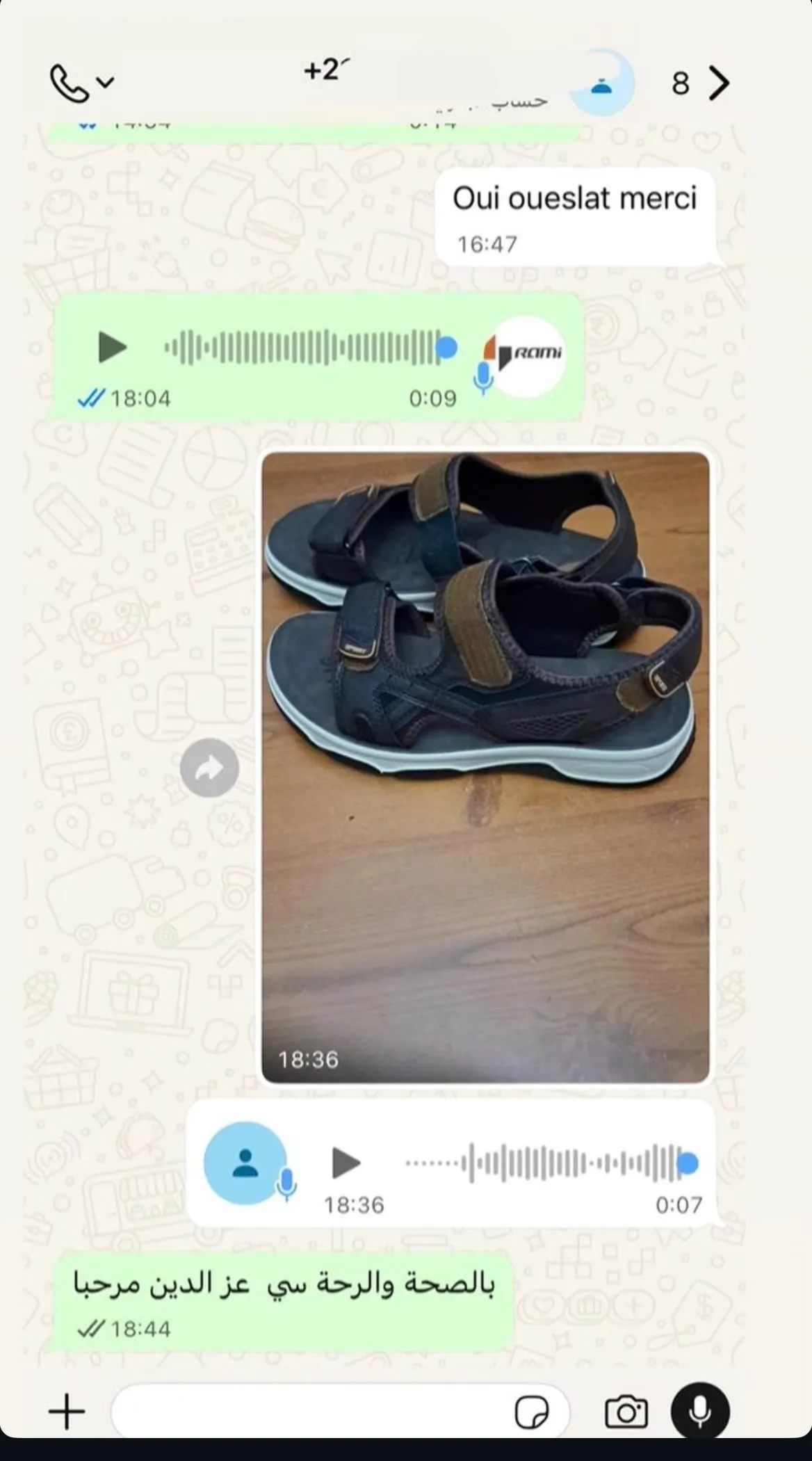 Message WhatsApp d'un client sur la livraison et le paiement à la réception